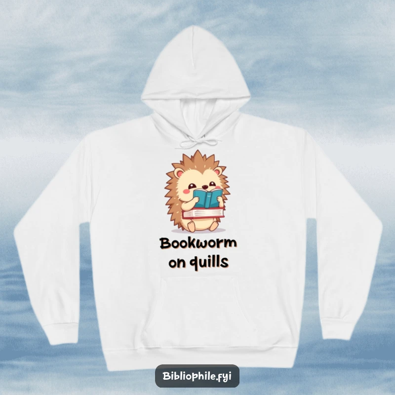 Funny kawaii hedgehog character balancing a book on its spines, featured on a warm and humorous hoodie.