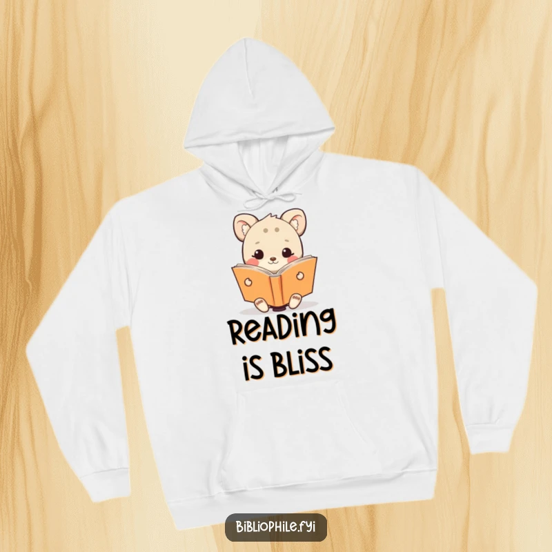Funny hoodie with a cute animal character happily reading an oversized book, offering comfort and radiating joy.