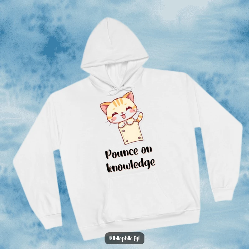 Funny kawaii cat character playfully pouncing at the bookmark's end, featured on a soft and warm hoodie for book enthusiasts.