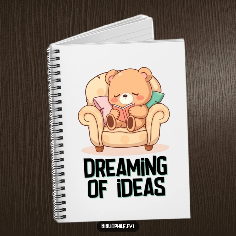 Funny Sleepy Bear Notebook featuring a sleepy bear character curled up on a comfortable armchair made of pillows, reading, ideal for journaling.