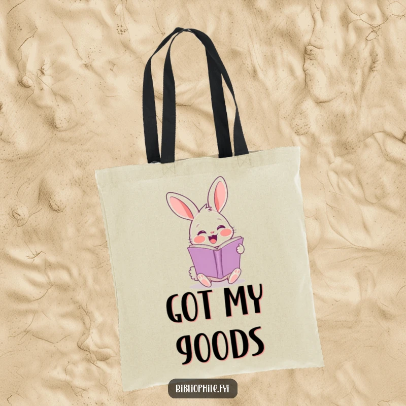 Funny rabbit tote bag with a cheerful character turning a page, perfect for carrying books.