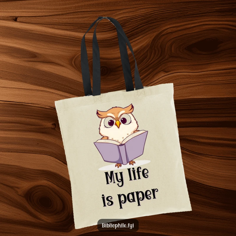 Funny tote bag with a cute owl character engrossed in reading, turning book pages with great enthusiasm, a great book lover accessory.